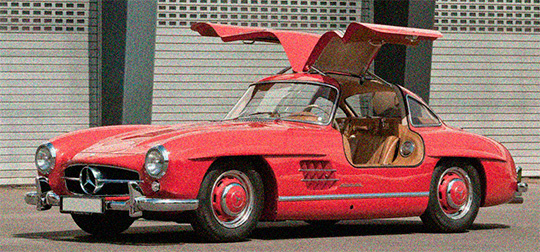 Mercedes-Benz 300 SL Gullwing (1954) rojo con las puertas abiertas